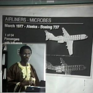 A man discussing airliners and microbes